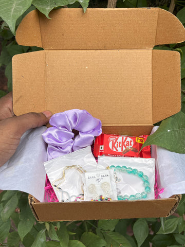 Gift box with accessories and treats with a free  ring